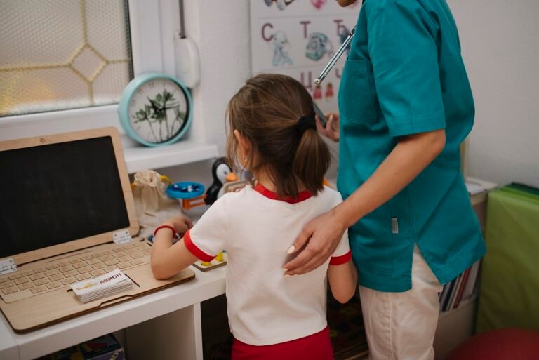 Child in medical consultation with caregiver at a home office